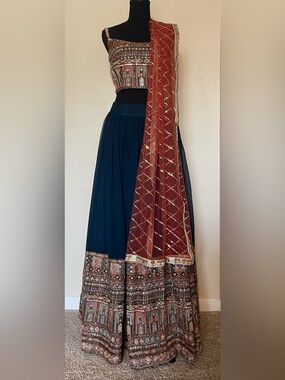 Blue and Orange Lehenga with detailed embroidery